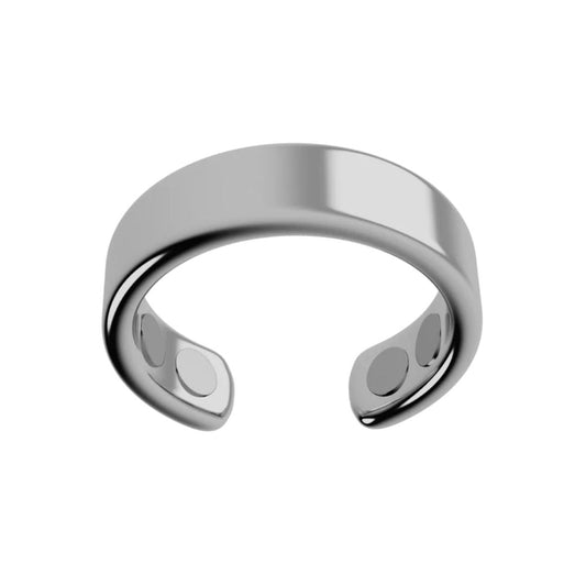 El Anillo de Magnoterapia - Alivio para la menopausia en color plateado es abierto, con acabado liso y dos imanes redondos internos para ayudar a aliviar los síntomas de la menopausia, exhibido sobre fondo blanco.