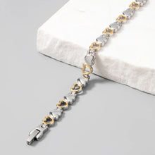 Cargar imagen en el visor de la galería, Pulsera magnética de corazones en acero inoxidable - Moroveta