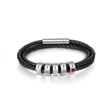 Cargar imagen en el visor de la galería, La Pulsera Piedras de vida - A mi Padre es una pulsera negra de cuero trenzado con seis cuentas de plata, cada una con piedra de nacimiento y nombre grabado. Un regalo ideal para el Día del Padre, rematada con un elegante broche plateado.
