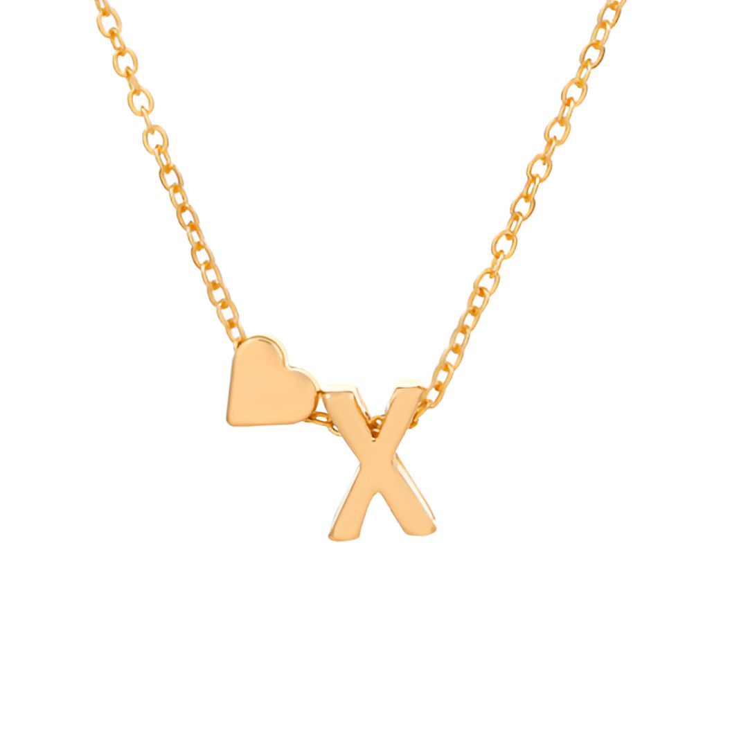 La Pulsera de tobillo con inicial, en color dorado, luce una delicada cadena con un dije de corazón y una letra "X", mostrando un estilo personalizado y elegante sobre fondo blanco.