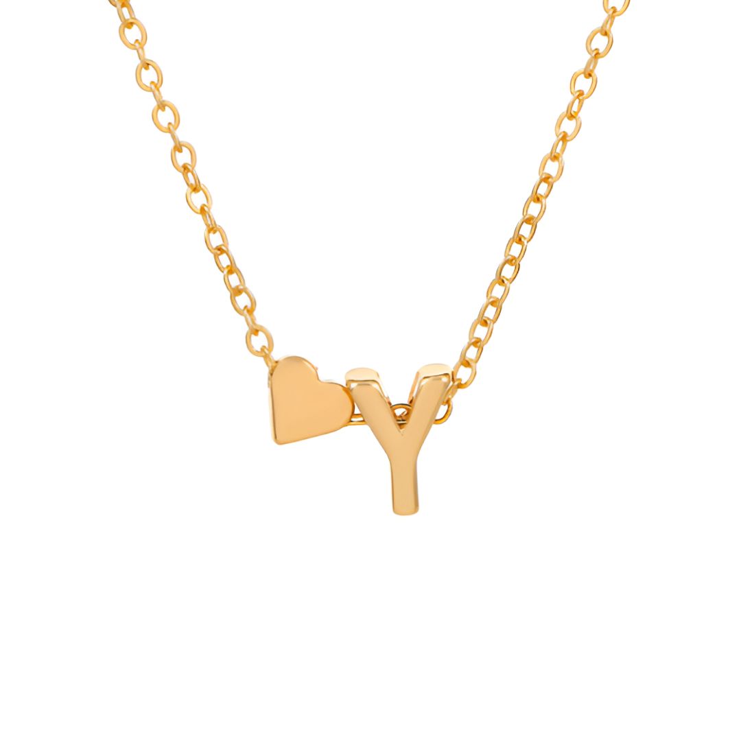A pulsera de tobillo con inicial en color dorado, adornada con un dije de corazón y la letra Y juntos, aporta un toque personalizado similar al elegante diseño minimalista del producto.