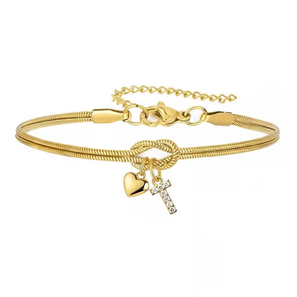 Pulsera dorada con inicial y dije de corazón