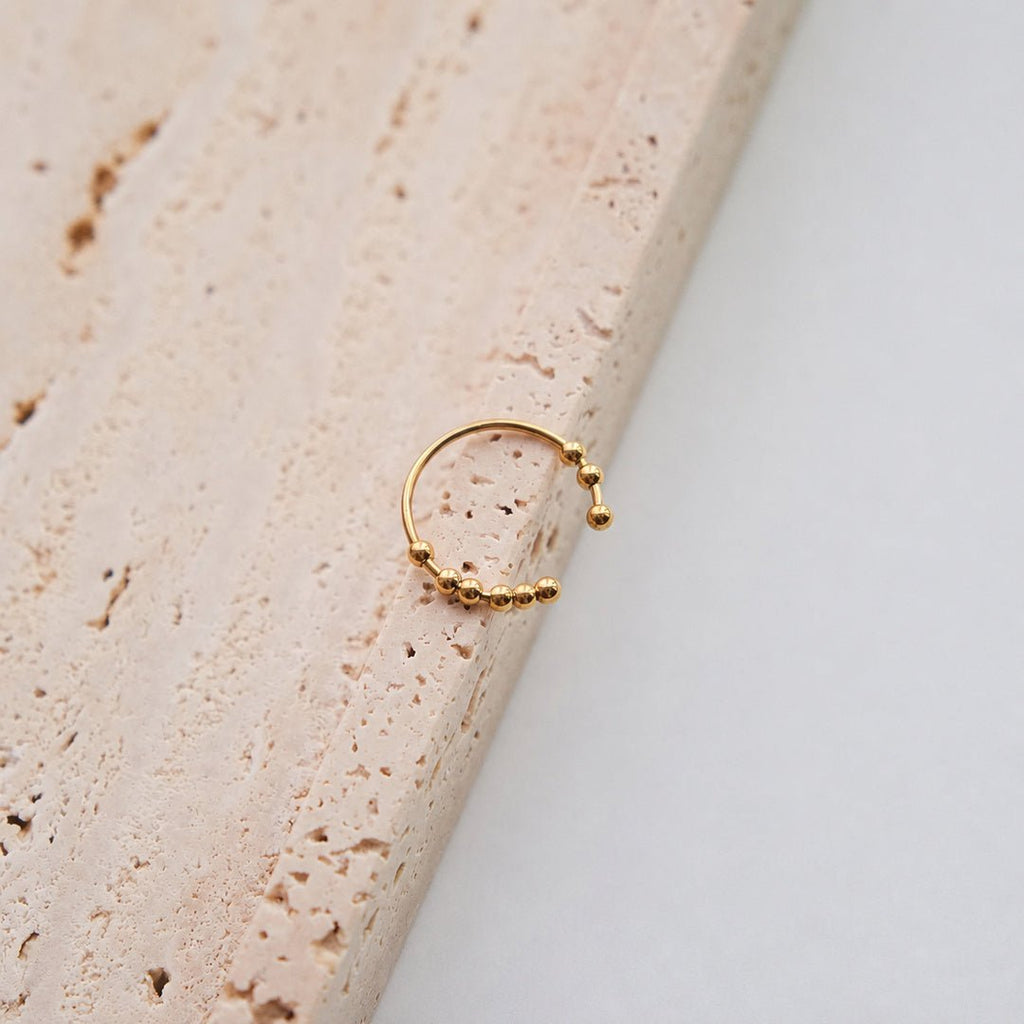 Anillo antiestrés ajustable con bolitas móviles - Moroveta