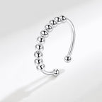Anillo antiestrés ajustable con bolitas móviles - Moroveta