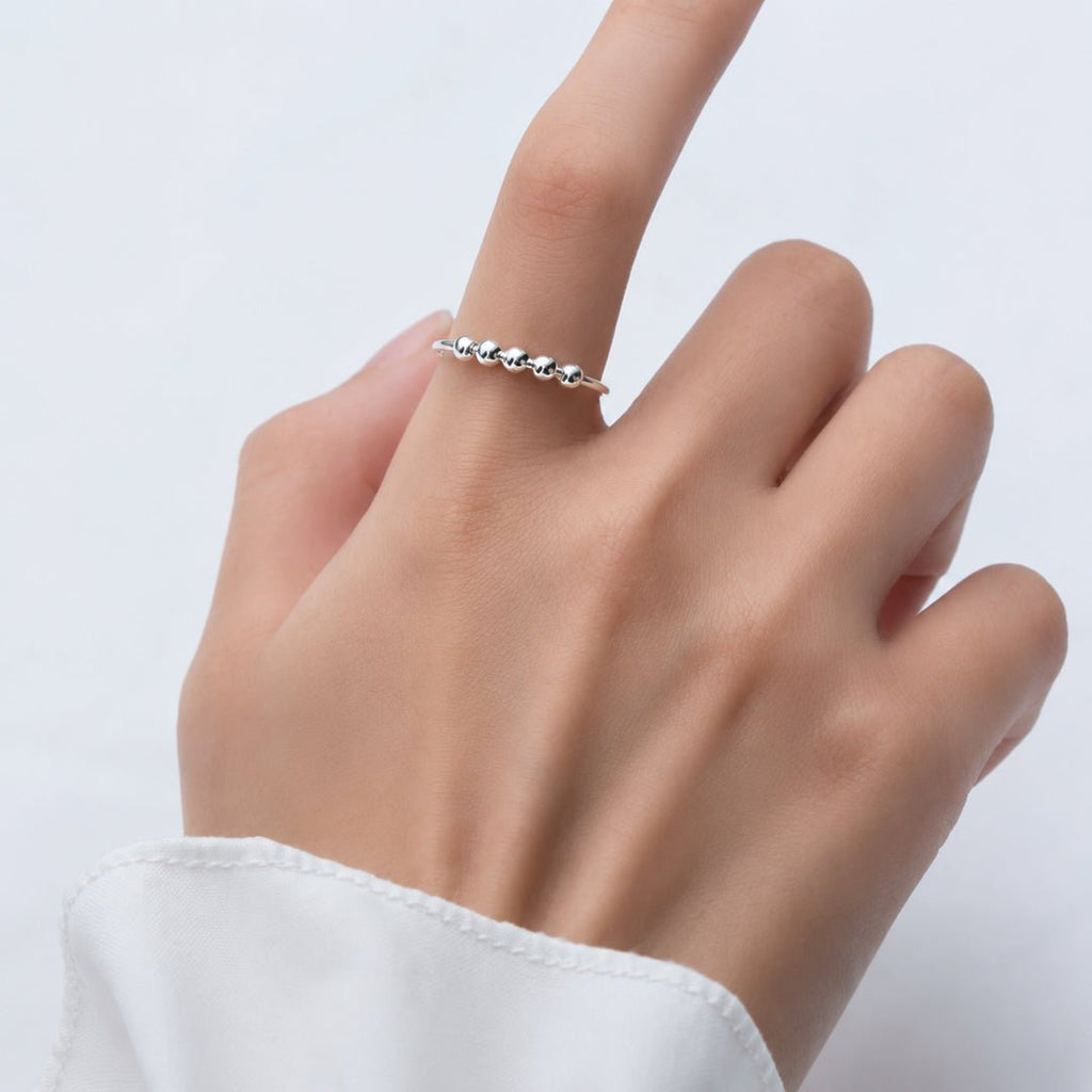 Anillo antiestrés ajustable con bolitas móviles - Moroveta