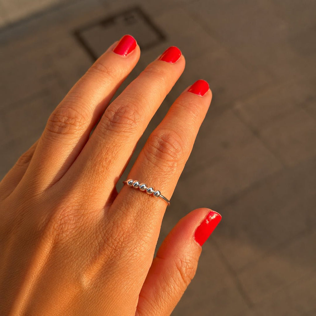Anillo antiestrés ajustable con bolitas móviles - Moroveta