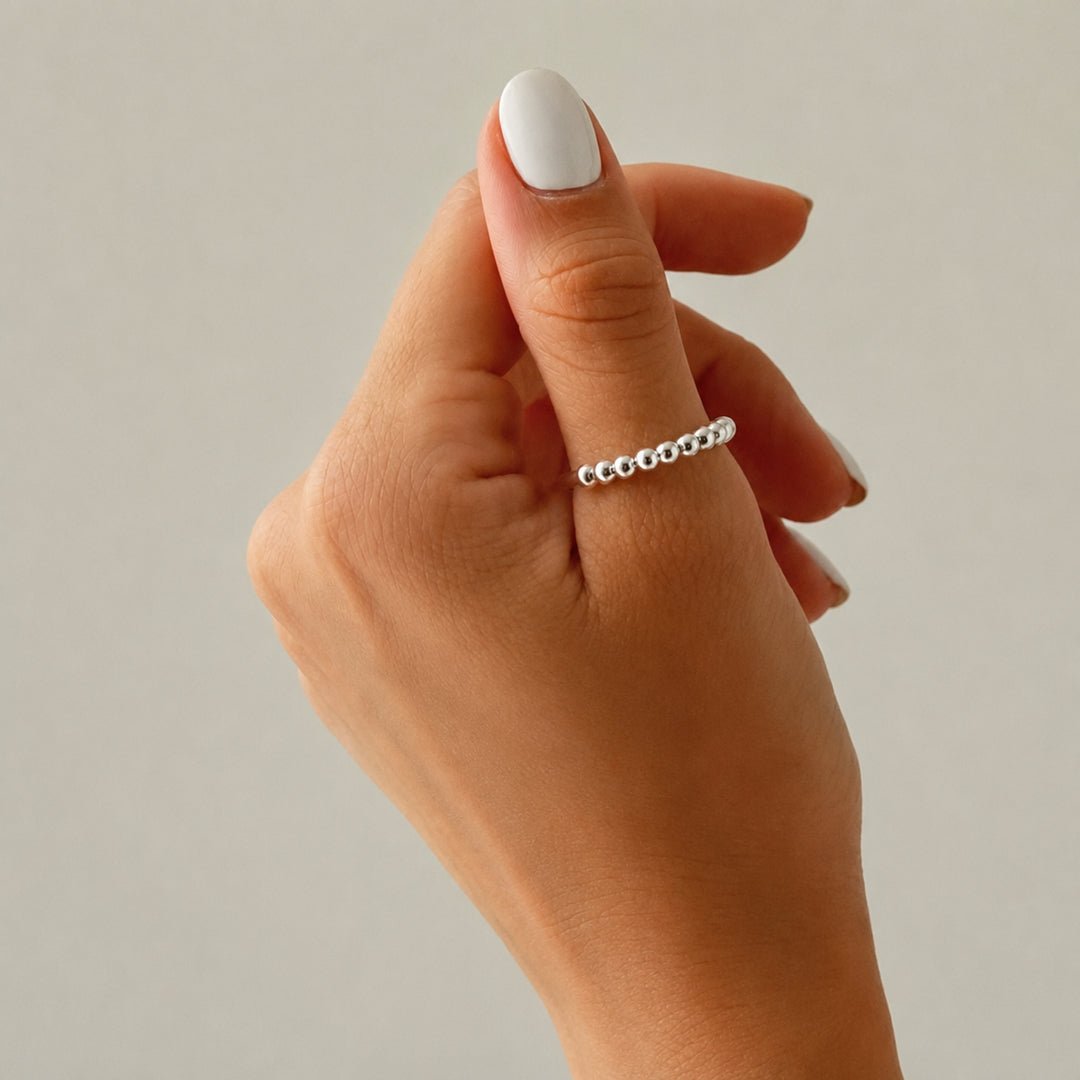 Anillo antiestrés ajustable con bolitas móviles - Moroveta