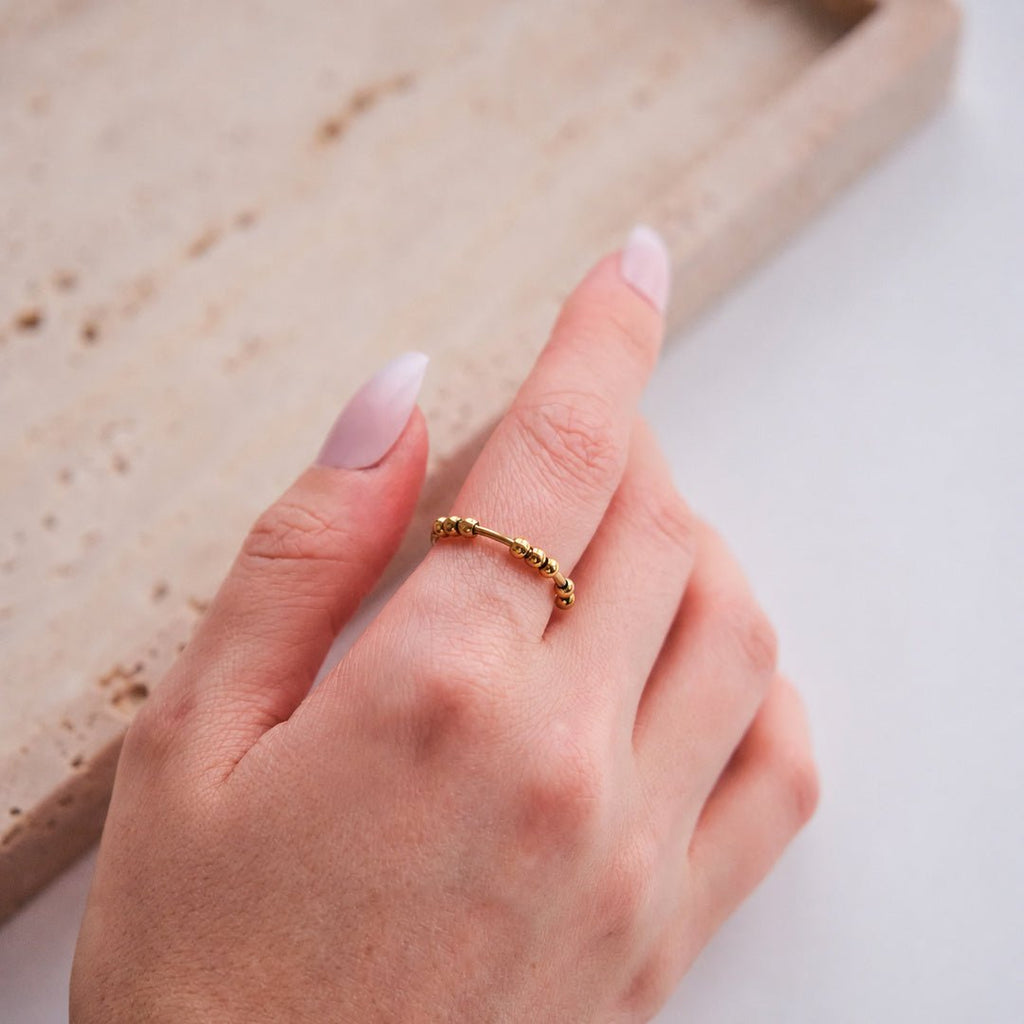 Anillo antiestrés ajustable con bolitas móviles - Moroveta