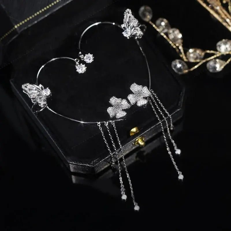 Aretes Mariposa pompón sin perforación - Moroveta
