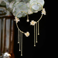 Aretes Mariposa pompón sin perforación - Moroveta