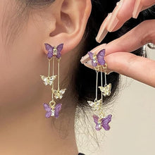 Cargar imagen en el visor de la galería, Aretes Mariposa púrpura - Moroveta