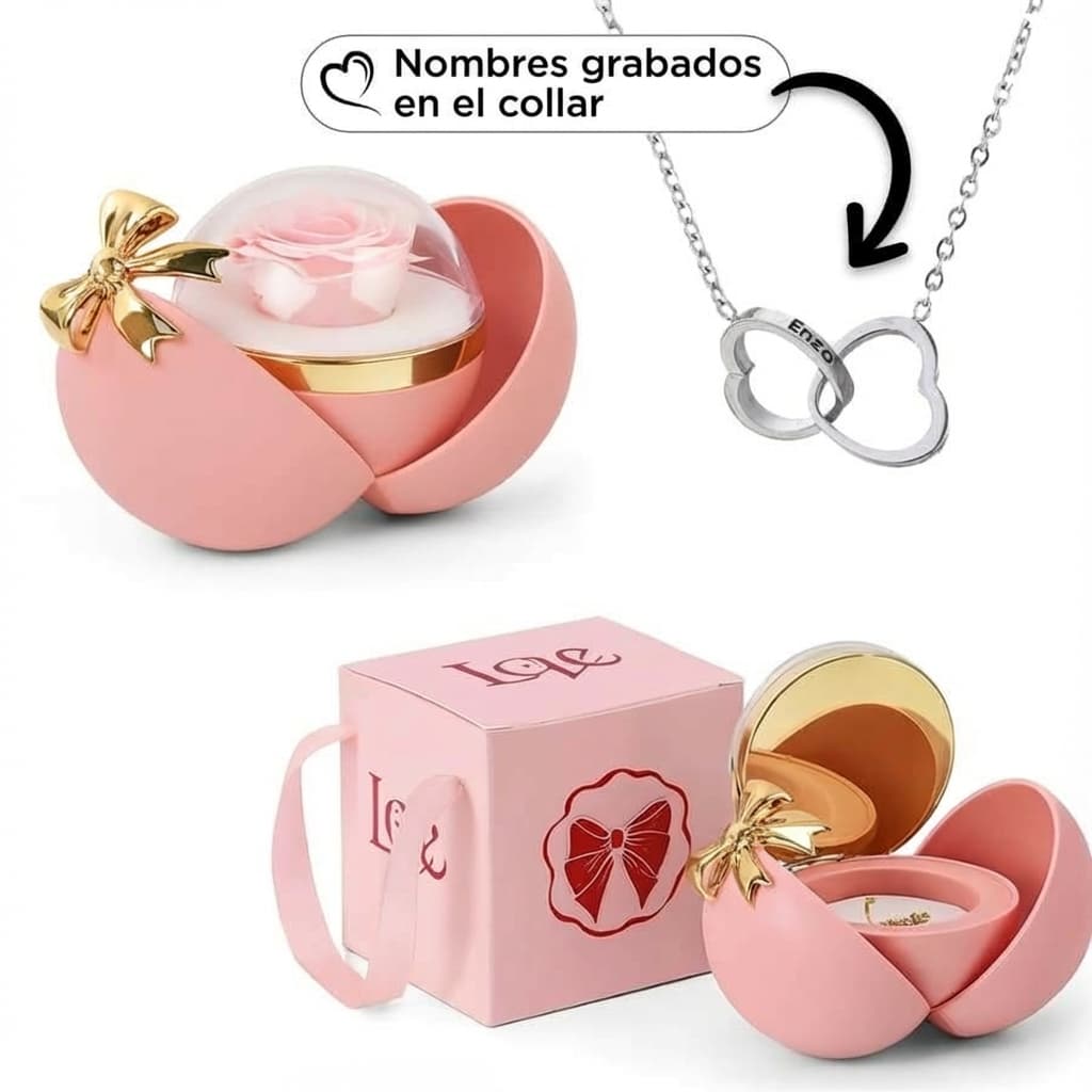 La Caja Corazón con rosa eterna y collar corazón personalizado incluye una caja rosa en forma de corazón con un lazo dorado, una rosa preservada, un portajoyas y un collar personalizado con dos anillos entrelazados para nombres grabados. La caja lleva la etiqueta "Love.