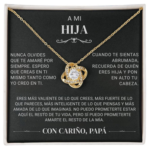 El "Collar 'A mi hija' - Con cariño Papá" es un collar de oro con un colgante brillante en una caja negra, con un sentido mensaje en español de padre a hija que expresa amor, ánimo y orgullo.
