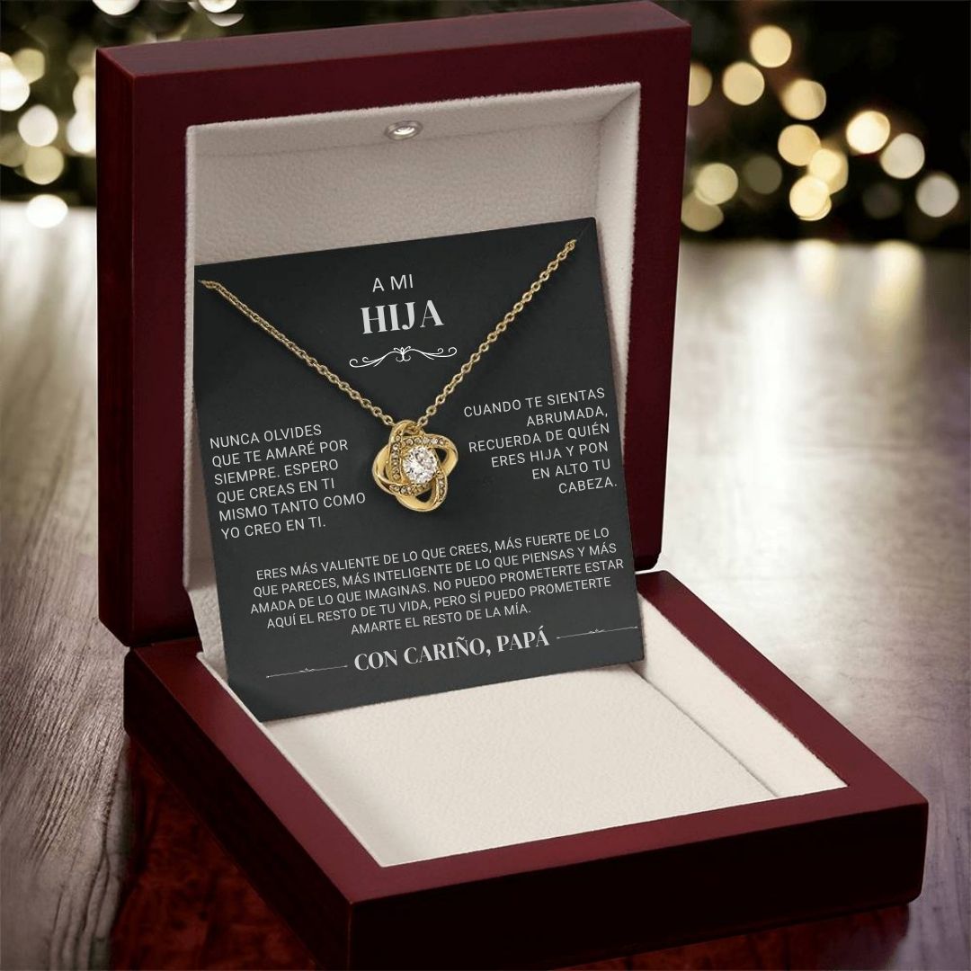 El collar "A mi hija" - Con cariño Papá se presenta en una caja de joyería roja, acompañado de una tarjeta en español que expresa el apoyo, amor y ánimo de un padre a su hija.