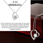 El collar Amor eterno es un collar de plata de acero inoxidable en forma de corazón con un colgante de cristal, bellamente presentado en un joyero. El mensaje en español expresa amor eterno-un regalo ideal para mujer y perfecto para una hermana querida.