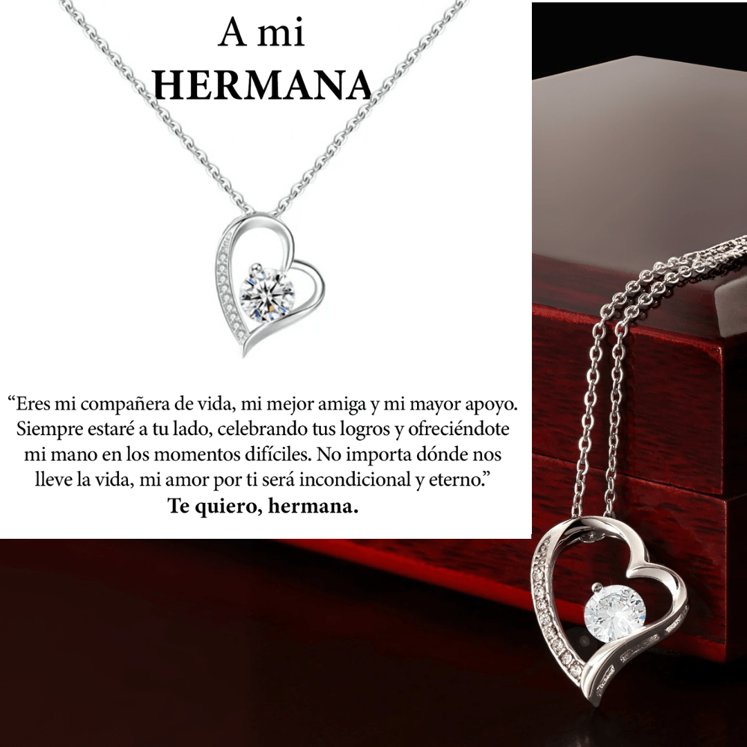 El collar Amor eterno es un collar de plata de acero inoxidable en forma de corazón con un colgante de cristal, bellamente presentado en un joyero. El mensaje en español expresa amor eterno-un regalo ideal para mujer y perfecto para una hermana querida.