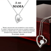 El collar Amor eterno, un collar de plata en forma de corazón con una joya central, se presenta en una caja con un texto en español que agradece a mamá su amor y su guía: un regalo para mujer inolvidable.