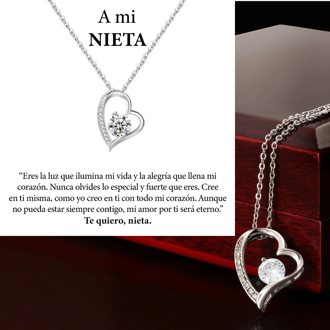 El collar Amor eterno es un collar de acero inoxidable en forma de corazón con una pieza central de cristal sobre una cadena, presentado en una caja de madera oscura. Incluye un texto en español de amor y ánimo para una nieta-regalo para mujer, firmado Te quiero, nieta.