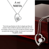 El collar Amor eterno es un collar de acero inoxidable en forma de corazón con una pieza central de cristal sobre una cadena, presentado en una caja de madera oscura. Incluye un texto en español de amor y ánimo para una nieta-regalo para mujer, firmado Te quiero, nieta.