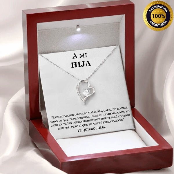 Collar Amor eterno - A mi hija: collar de acero inoxidable plateado con dije corazón y gema, en caja de madera grabada con mensaje español para hija. Incluye etiqueta de satisfacción garantizada. Ideal como regalo para hija.