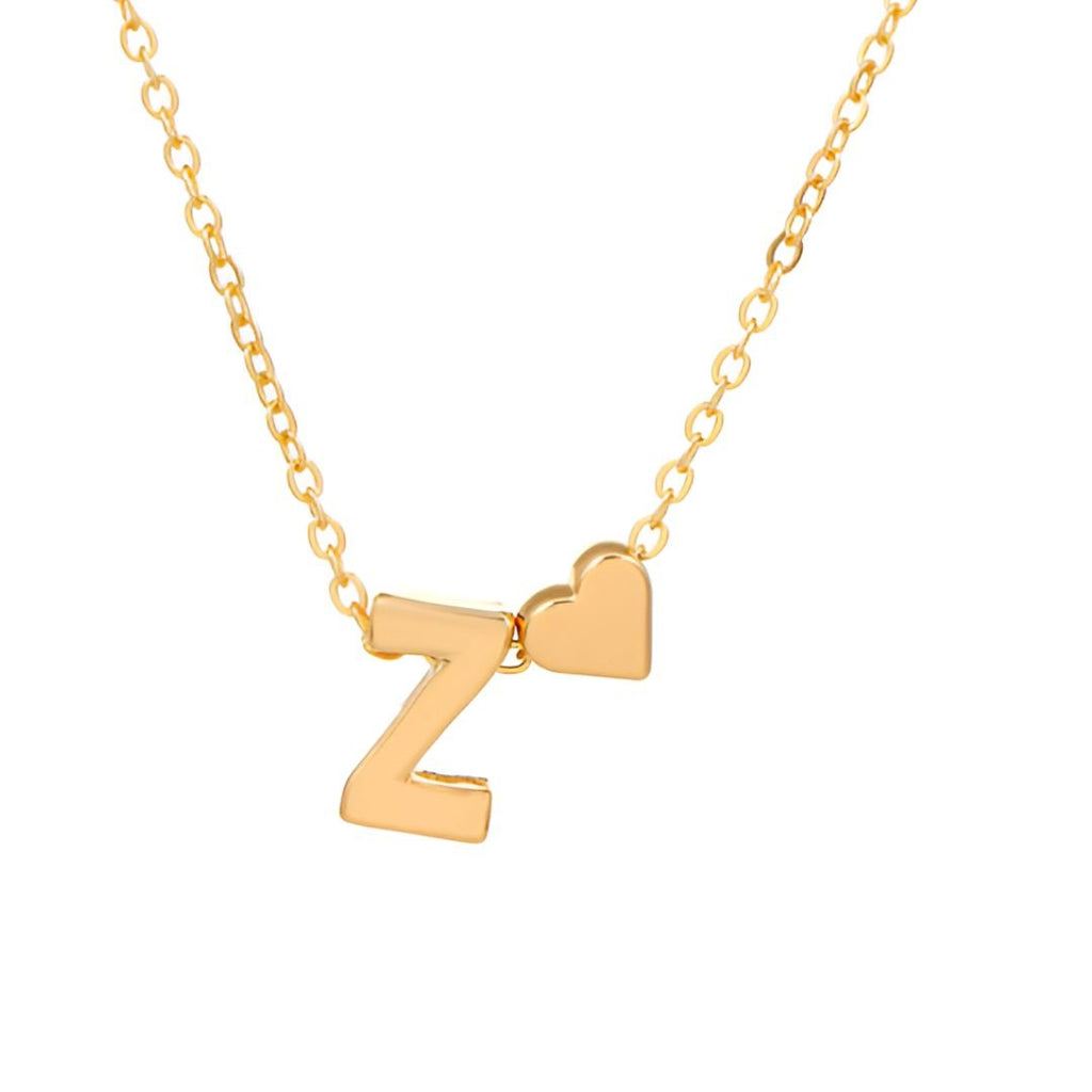 Collar con inicial y corazón: un delicado collar de oro con colgante de letra Z junto a un pequeño corazón, ideal como regalo personalizado.