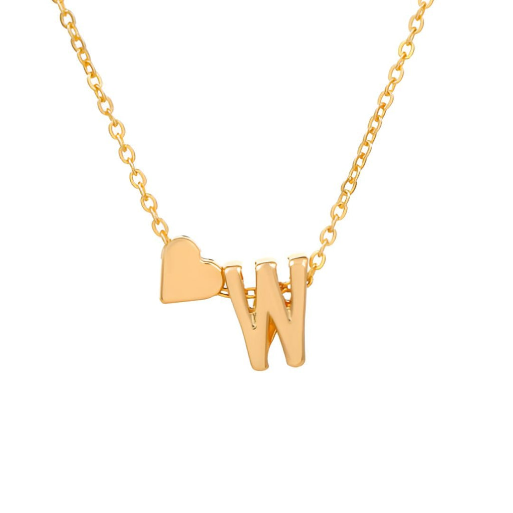 El collar con inicial y corazón incluye una cadena de oro con un colgante de corazón junto a la inicial que elijas, un regalo personalizado perfecto. Ambos colgantes se unen con elegancia para dar un toque de estilo y significado.