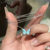 Collar de mariposa que brilla en la oscuridad - Moroveta