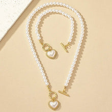 Cargar imagen en el visor de la galería, Conjunto de pulsera y collar con colgante de corazón de perlas - Moroveta