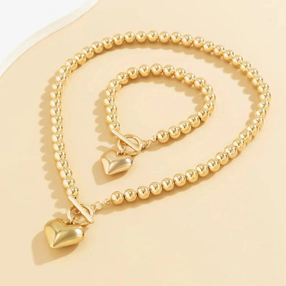 Conjunto de pulsera y collar con colgante de corazón de perlas - Moroveta