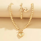 Conjunto de pulsera y collar con colgante de corazón de perlas - Moroveta