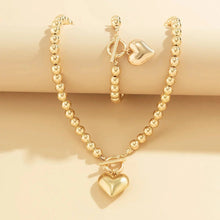 Cargar imagen en el visor de la galería, Conjunto de pulsera y collar con colgante de corazón de perlas - Moroveta