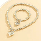 Conjunto de pulsera y collar con colgante de corazón de perlas - Moroveta