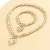 Conjunto de pulsera y collar con colgante de corazón de perlas - Moroveta
