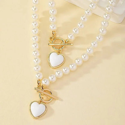 Conjunto de pulsera y collar con colgante de corazón de perlas - Moroveta