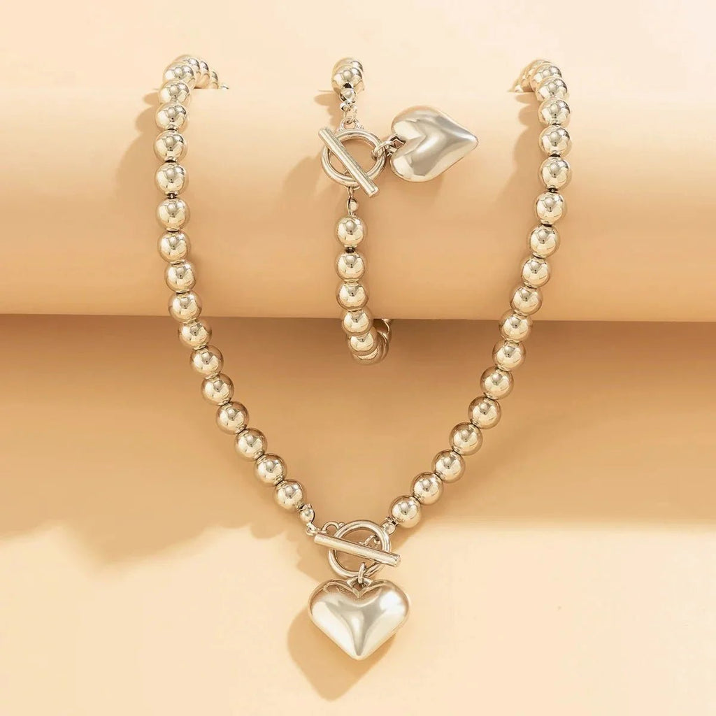 Conjunto de pulsera y collar con colgante de corazón de perlas - Moroveta