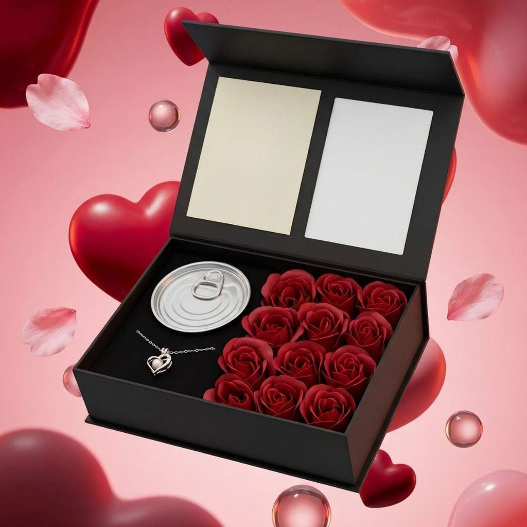 La Experiencia Perlitta - Ostra real incluye una caja de regalo negra con rosas rojas artificiales, un collar de perlas auténticas, una lata de ostras con perlas y dos tarjetas en blanco, perfectas para un regalo experiencial.