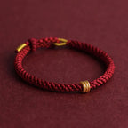 Pulsera Hilo rojo del destino con cuenta Dorada