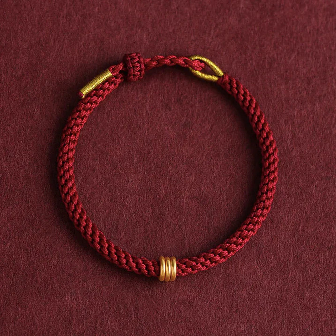Pulsera Hilo rojo del destino con cuenta Dorada
