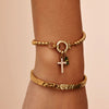 Pulsera con dije de cruz y piedra de nacimiento - Moroveta