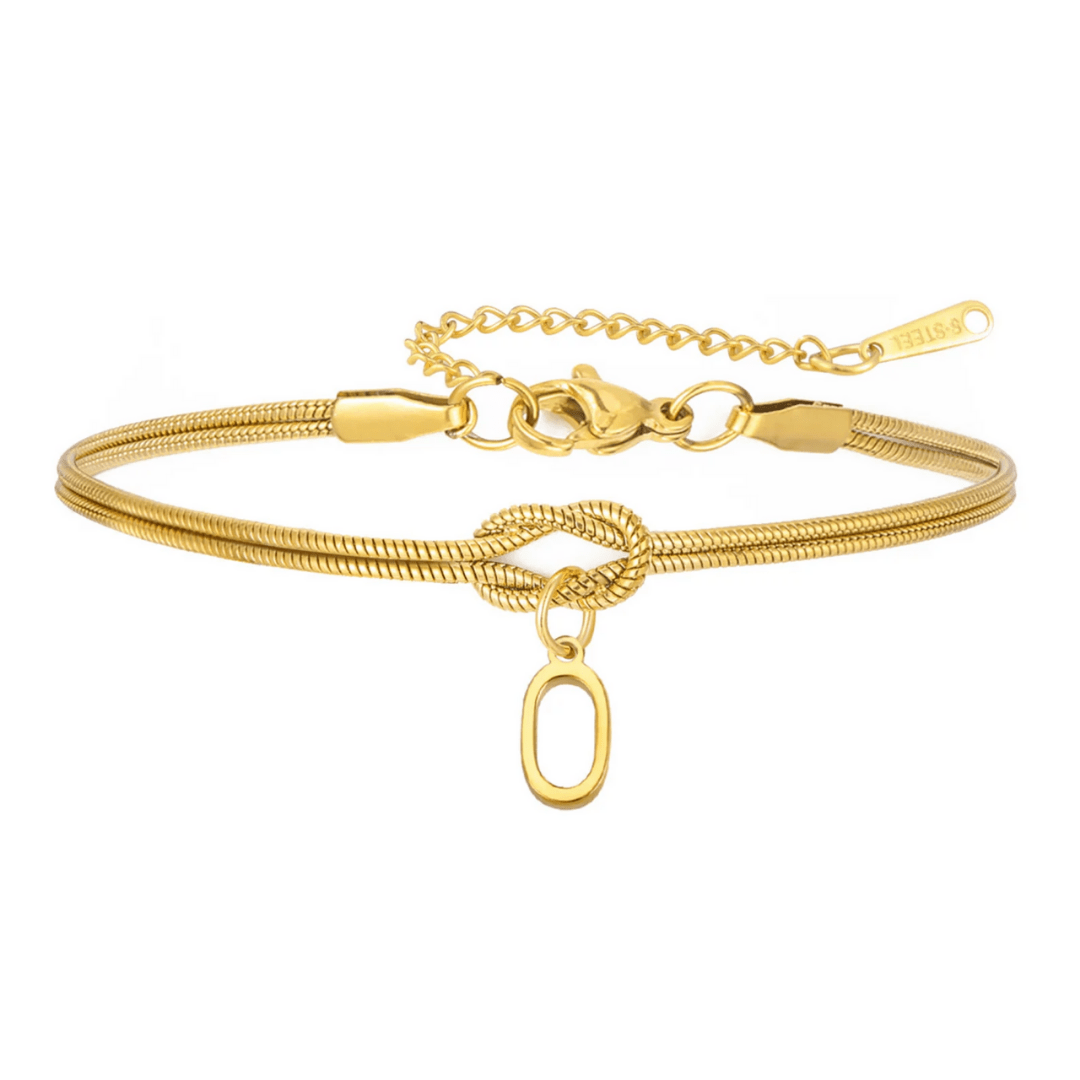 Pulsera de nudo con inicial: pulsera personalizada tipo cadena de serpiente dorada, con nudo, dije ovalado colgante, broche ajustable y etiqueta STEEL. Un regalo inolvidable o pulsera única con tu inicial.