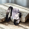 Dos pulseras de cuero trenzado negro 