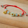 Pulsera de hilo rojo de protección y prosperidad - Moroveta