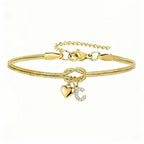 Pulsera dorada con inicial y dije de corazón - Moroveta