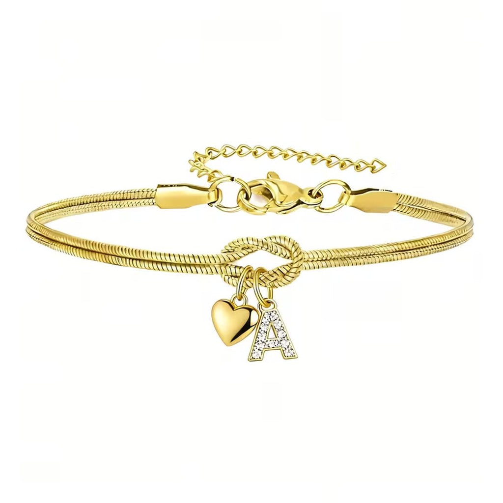 Pulsera dorada con inicial y dije de corazón - Moroveta