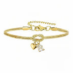 Pulsera dorada con inicial y dije de corazón - Moroveta