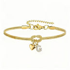 Pulsera dorada con inicial y dije de corazón - Moroveta