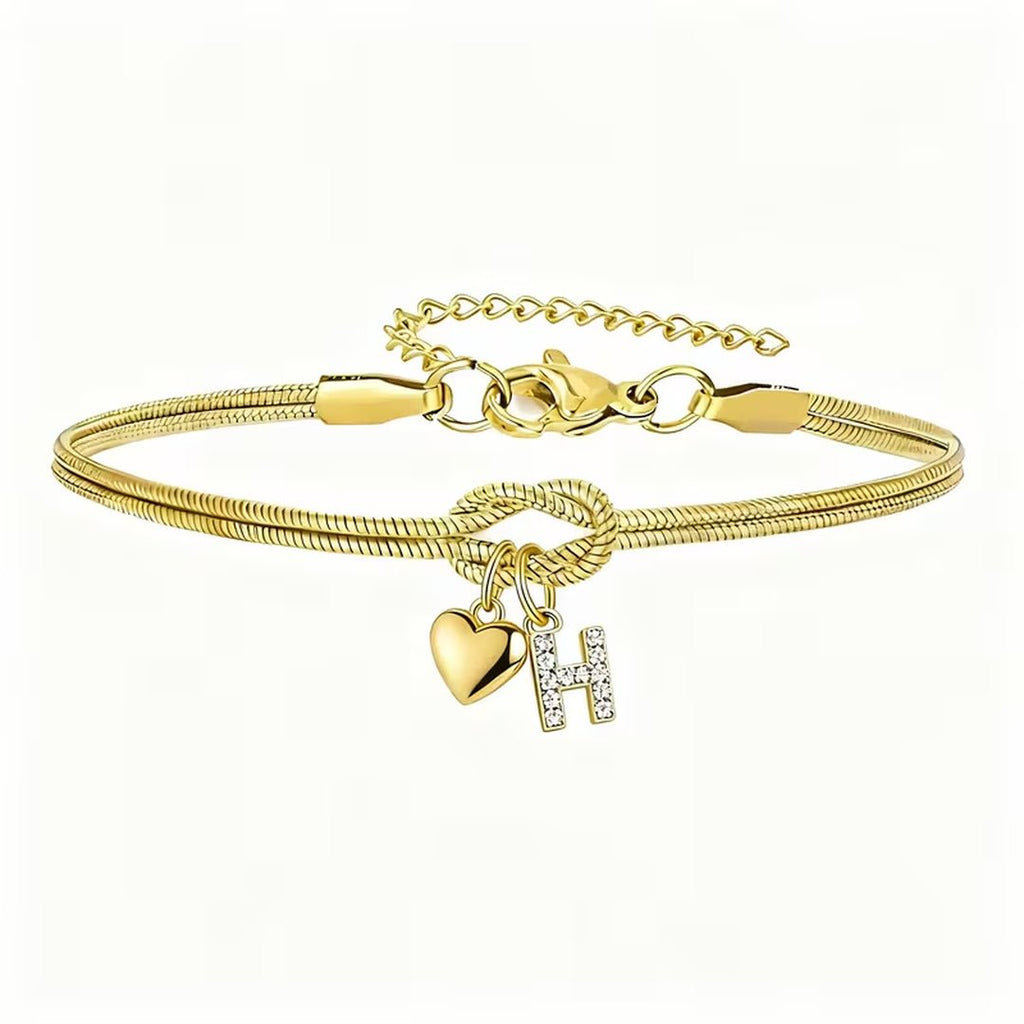 Pulsera dorada con inicial y dije de corazón - Moroveta