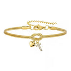 Pulsera dorada con inicial y dije de corazón - Moroveta
