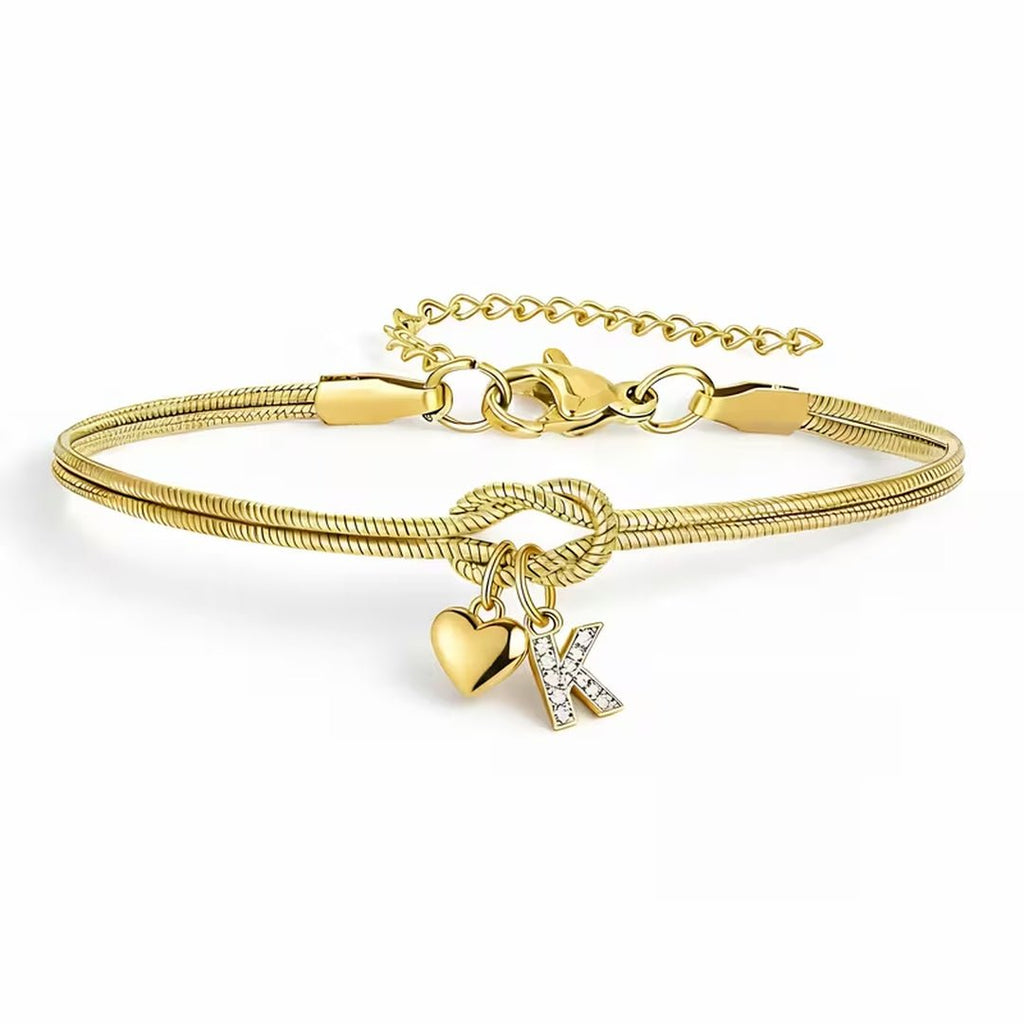 Pulsera dorada con inicial y dije de corazón - Moroveta