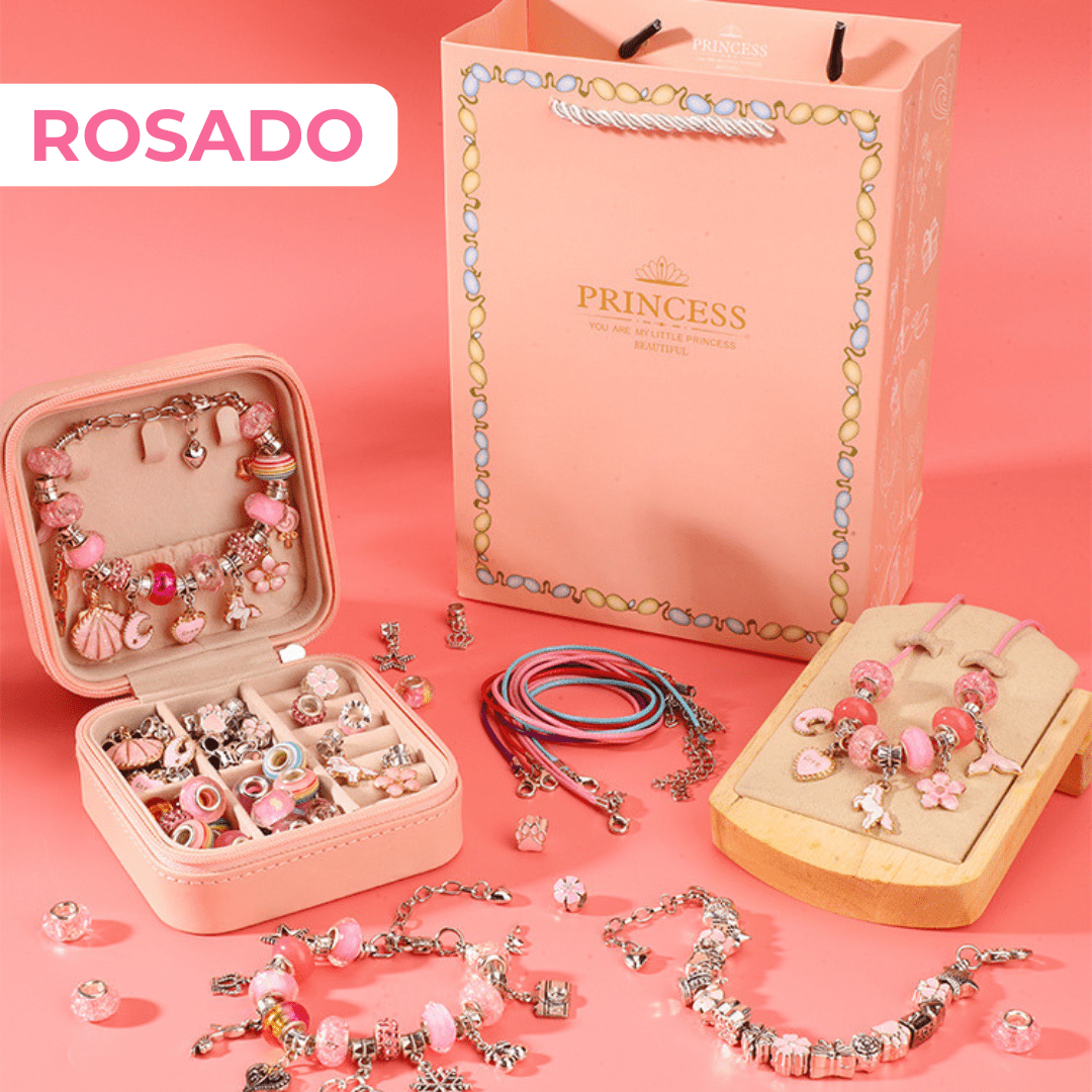 El Set de joyería para crear pulseras y collares + accesorios incluye piezas rosas, caja joyero y bolsa Princesa-ideal como kit de joyería para niños o para quienes buscan juguetes estimulantes en un fondo rosa. ROSADO aparece en la etiqueta.